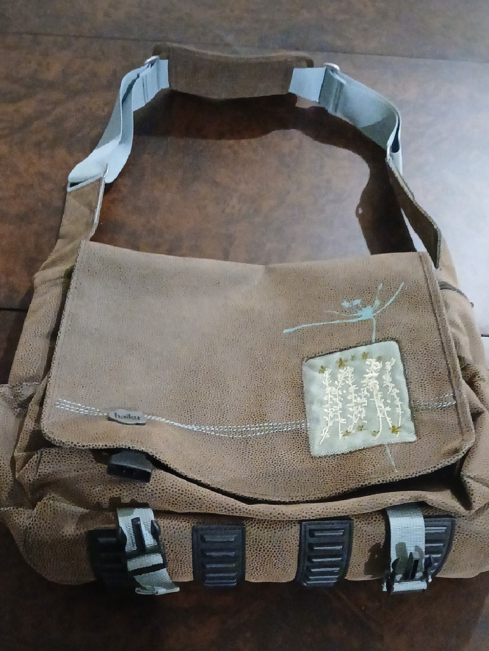 Haiku Brown Canvas Messenger Bag with Tan Embroidery